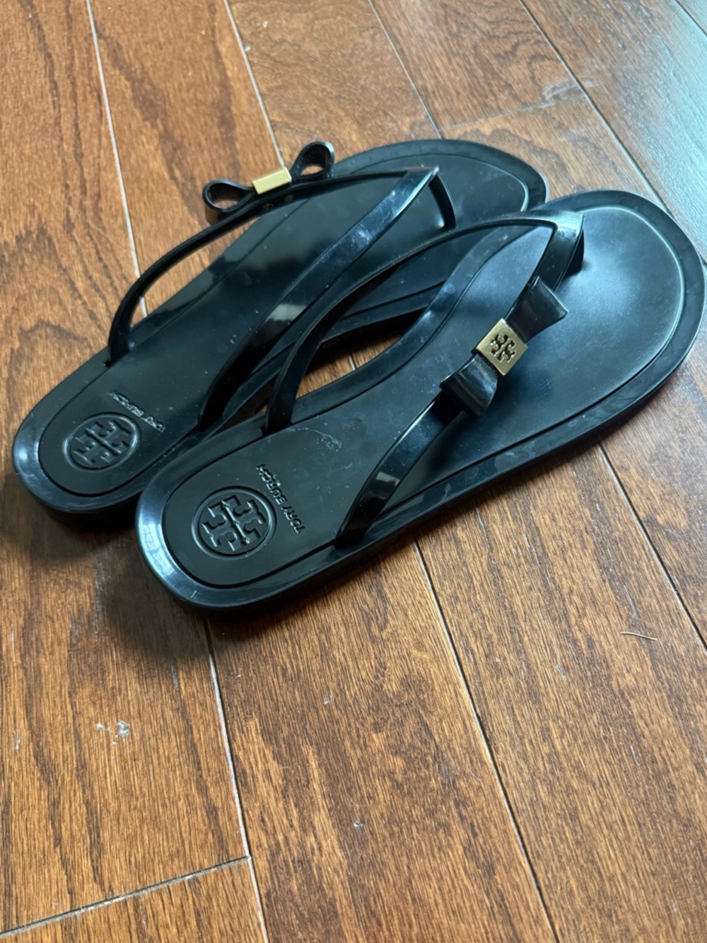 Tory Burch Black Jelly Bow Flip Flops with Gold Logo Accent - Picture 4 of 10